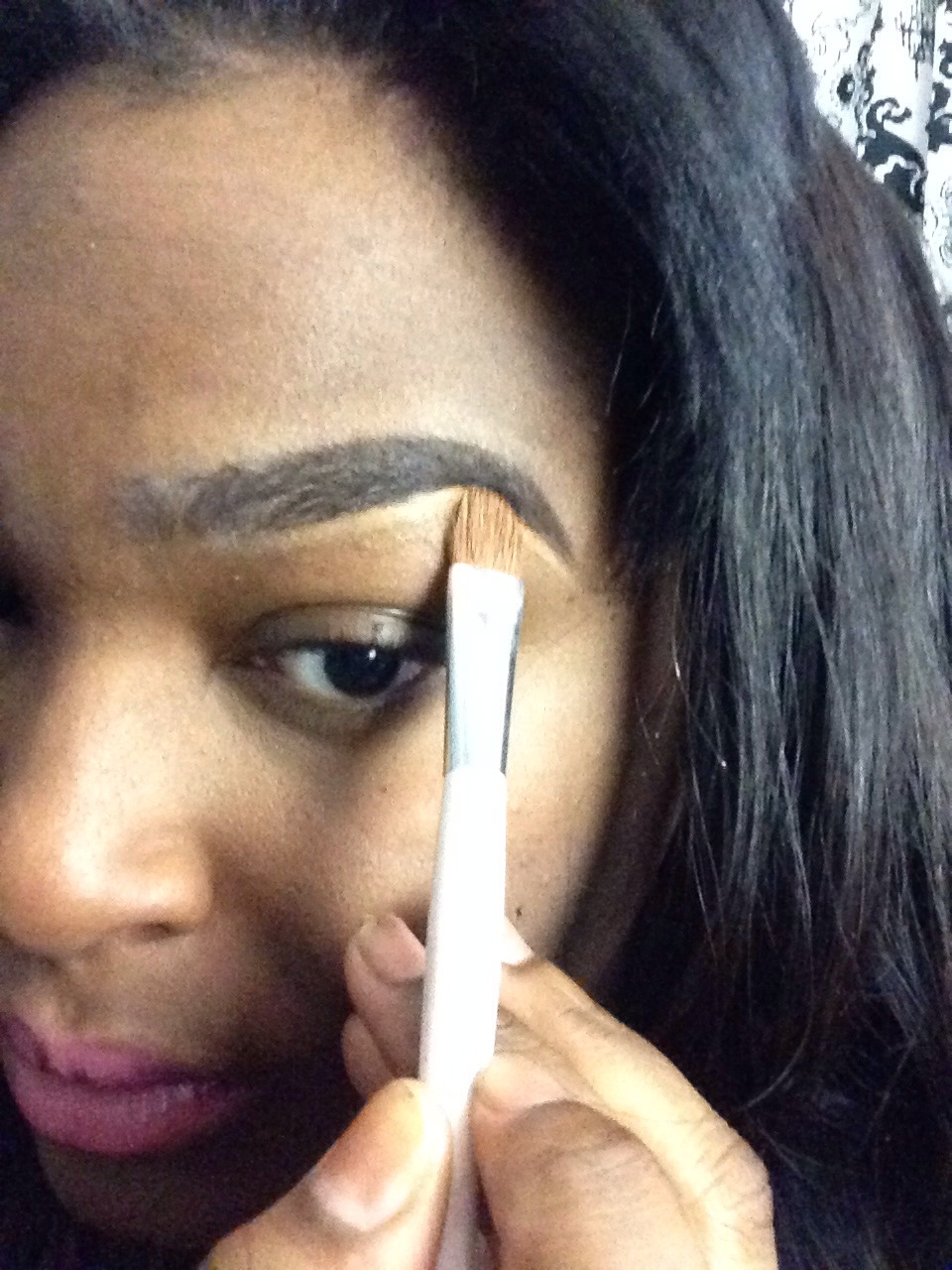 Grab your concealer brush and apply concealer under brow to Highlight and erase any mistakes