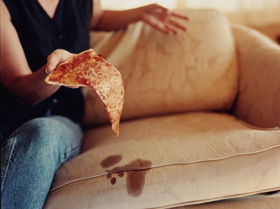 Be gone with those horrifying grease stains!Just sprinkle baby powder on a powder puff or cotton ball and dab at the grease. Rub the powder into the stain and then just shake or brush off any powder that is leftover. Repeat until you see the grease has been removed. Then just wash as usual! 