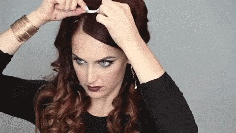 Apply the temporary tattoo on a strand of hair, humidify the tattoo with a Wet cloth, wait a minute then take off the paper of your hair and voilà! You are done! 