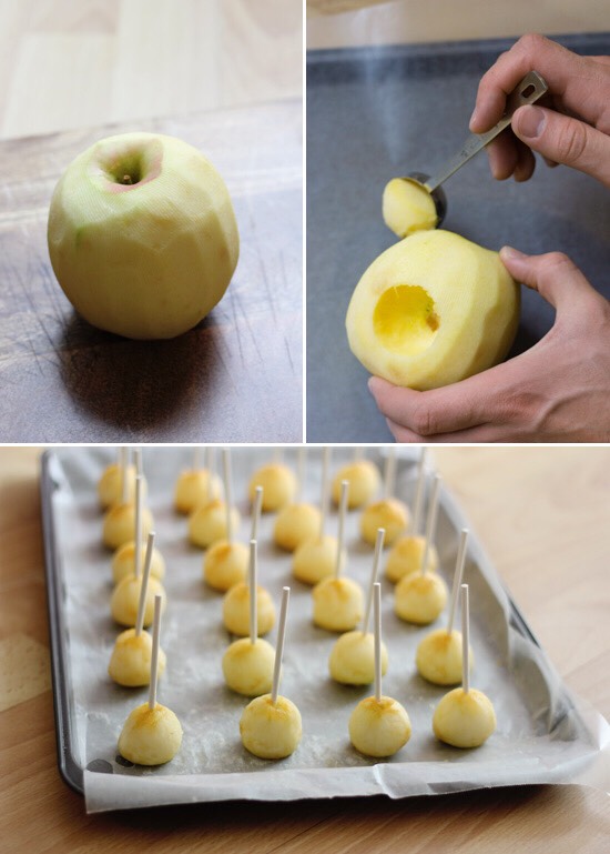First, prepare a cookie sheet or some plates with wax paper on top. Peel the apples, then scoop balls out of them with the metal coffee scoop. Push a lollipop stick into the middle of each ball. Pat them dry with a paper towel and put them in the fridge or freezer while you make the caramel.