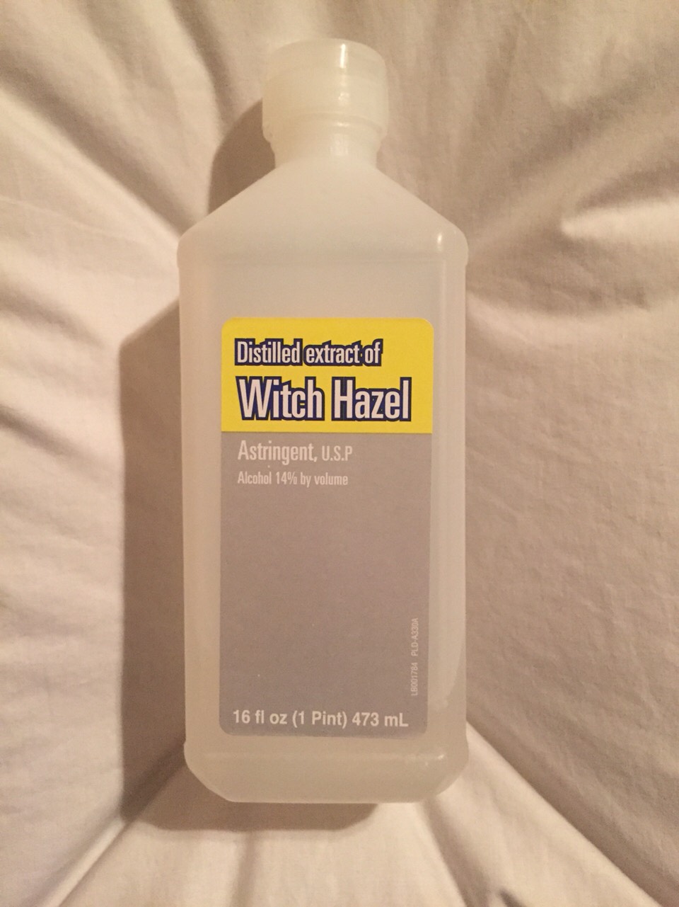 pour the witch hazel into the GLASS bottle. it must be glass because you're putting the essential oils in it.