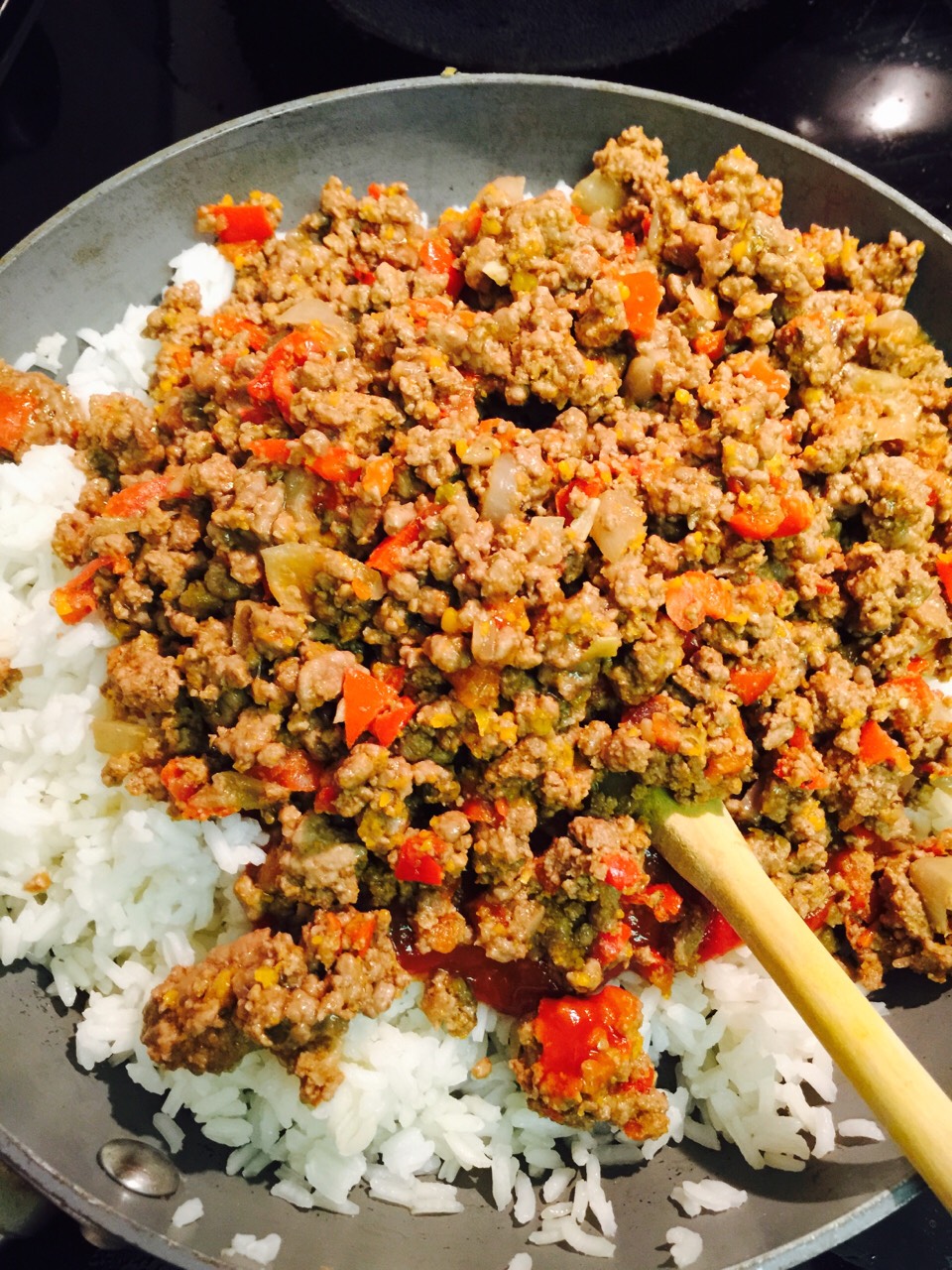 Meat, onions, garlic, mini peppers, and rice! (I also added the sauce)