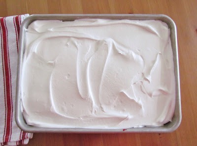 If you haven't done so already, crush your Oreo cookies.
I just place mine in a ziploc bag and crush them with a rolling pin. Leave some of the pieces big. It's nice to have a bit of a crunch when you eat the cake.