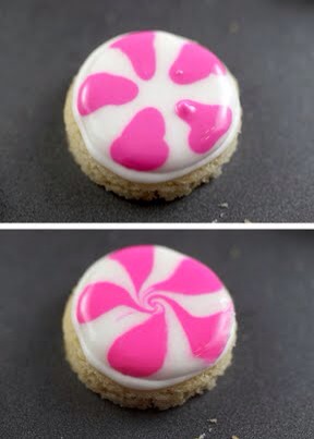 Pipe dots of pink around the perimeter and use a toothpick to pull the pink toward the center of the cookie to create the peppermint design. (See photos above). Repeat with the remaining cookies and let dry for 24 hours.