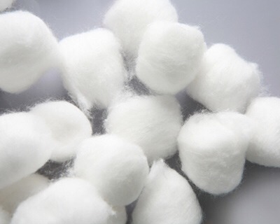 2) Gather a few cotton balls. Use the cotton ball to dip in the coffee and gently pat it around your eyes. Be careful, if it is too hot to dip your finger in the coffee then it is too hot to put it near your eye. Gently press or hold the cotton ball on your eye until the warmth goes away