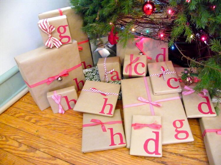 When wrapping gifts, decorate with each family members initial. 
