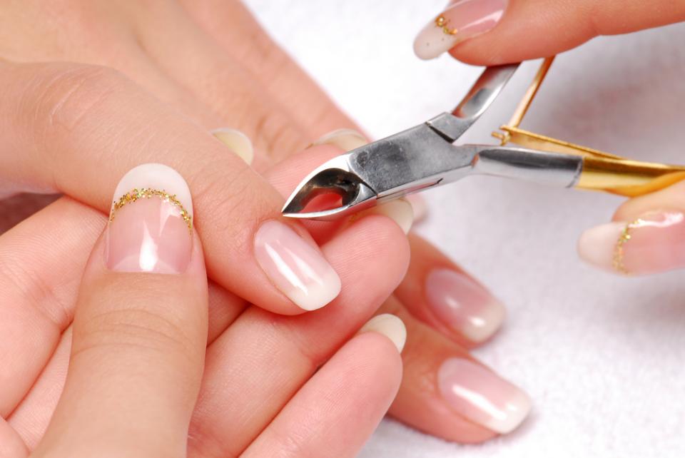 Softening Cuticles
If you wash your hands often or your cuticles just need a little T.L.C., apply coconut oil to your fingers twice a day
