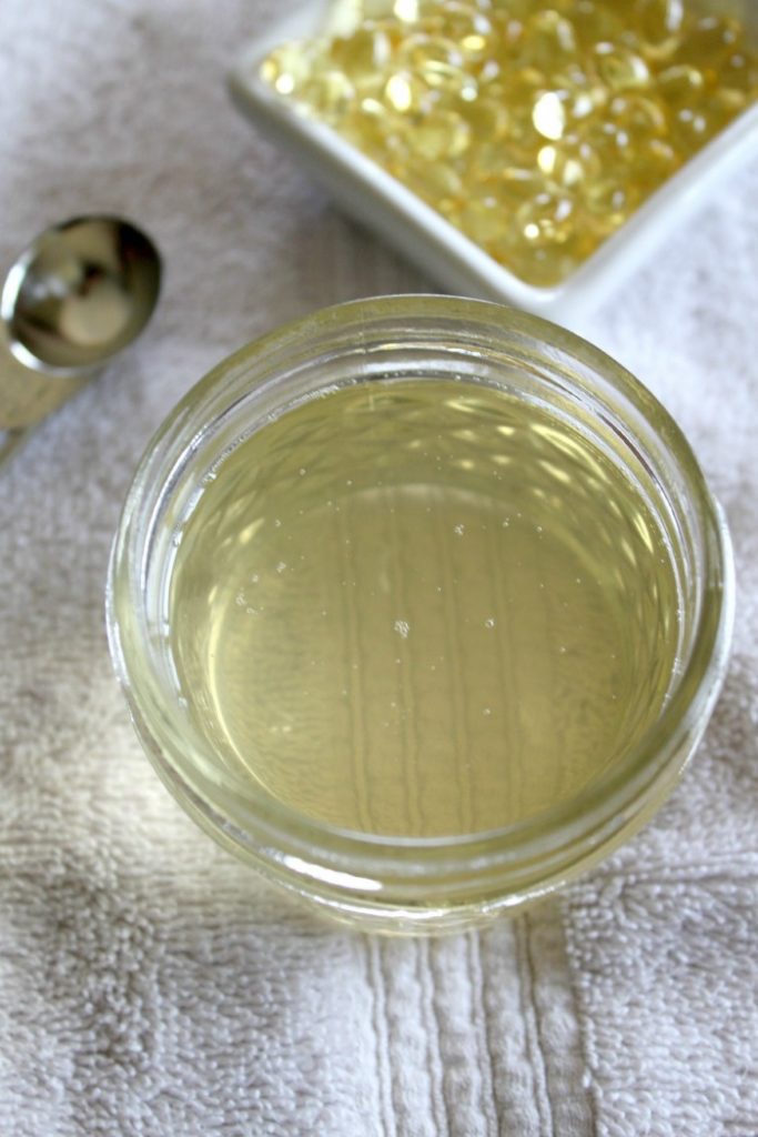 Add in ¼ teaspoon of Rose essential oil + 10 drops of Frankincense Essential Oil.

Pour mixture into a small glass container + put it in refrigerator for about 1hr or until the liquid returns to solid form. After it turns to a solid, there is no need to keep it refrigerated. The oils will not become rancid. Use a small amount at nighttime, under your eyes + prepare to look refreshed! You can also use before applying makeup.   Just give it 10 mins to soak into your skin before applying makeup.
