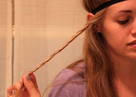 Twist your hair away from your face.