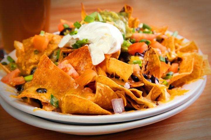Tortilla Chips + Cream Cheese
Here's another delicious combination of salty and sweet. The next time you're out of salsa to dip your tortilla chips in, try dipping them in cream cheese instead! This also works well with Doritos chips!
