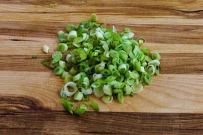 Slice up about 1/4 cup thinly sliced green onion.