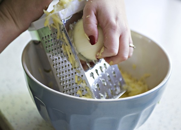 - Finely grate the potatoes with the onions in a large bowl & drain any liquids.
- Mix the rest of ingredients with the potatoes & onions , then add enough flour to thicken the mixture. 
 Tip: I put garlic in my mix just to change it up a bit , so have fun seasoning your potato pancakes 👍 