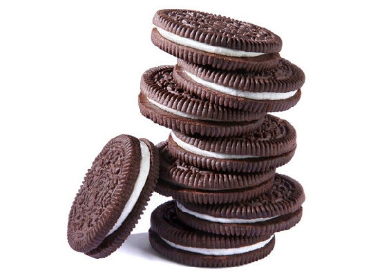 Next, pick up an oreo and dip it into the pancake batter until the oreo is completely covered in the batter!