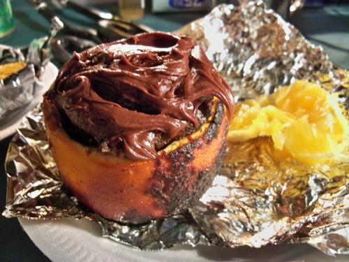 I can't imagine cake without frosting so I brought some along to top each cake. I also served up the cake with some of the scooped out orange. Now I'm wondering what other kinds of cakes I could bake inside of oranges!