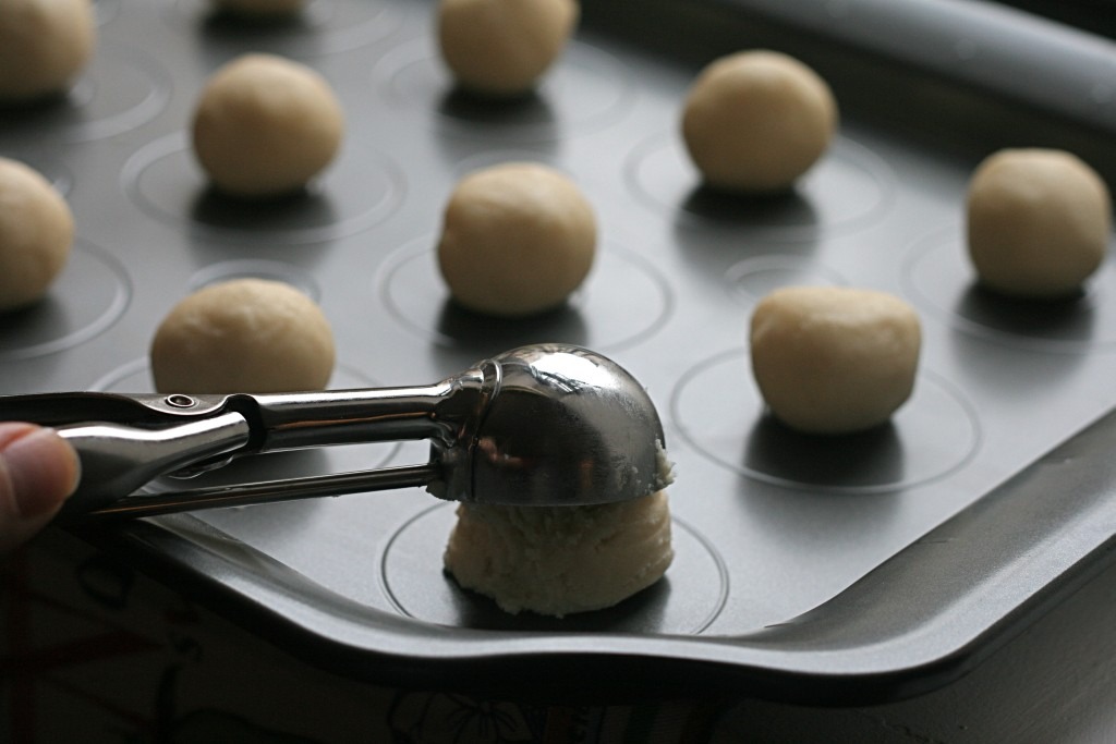 Use cookie scoop to form balls