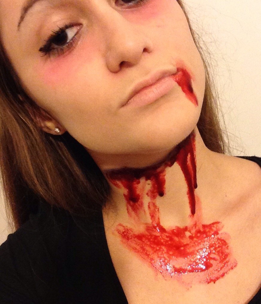 You can also add some to the corner of your mouth and let it drip as well so it looks like you coughed up some blood. 