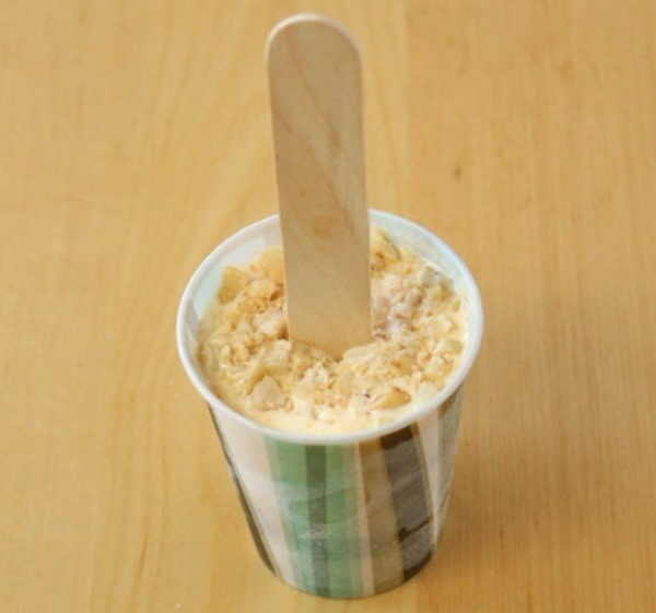 Stick a Popsicle stick in the middle and freeze overnight. 