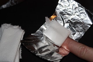 9. Glitter nail polish is a nightmare to remove, but if you soak a cotton ball in nail polish remover, place on your nail, wrap your finger tip in tin foil and let it sit for five minutes, the glitter will slide right off.
