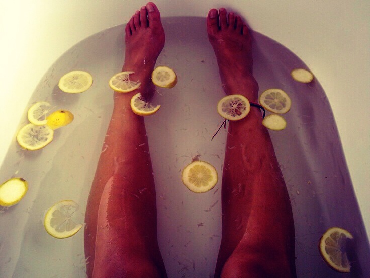 Run a warm (not hot) bath, add glass of Epsom Salt and lemon slices. Relax for 30 minutes. The mixture will instantly make you feel better and get rid of all the toxins in your body making you look and feel slimmer! 