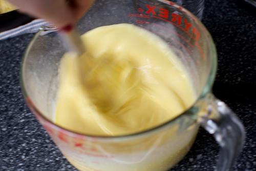 In a large bowl whisk together eggs, remaining 2 tablespoons sugar (if using; I skipped this) and 1/4 mascarpone cheese (save rest for serving), until very smooth. Add milk and almond extract.