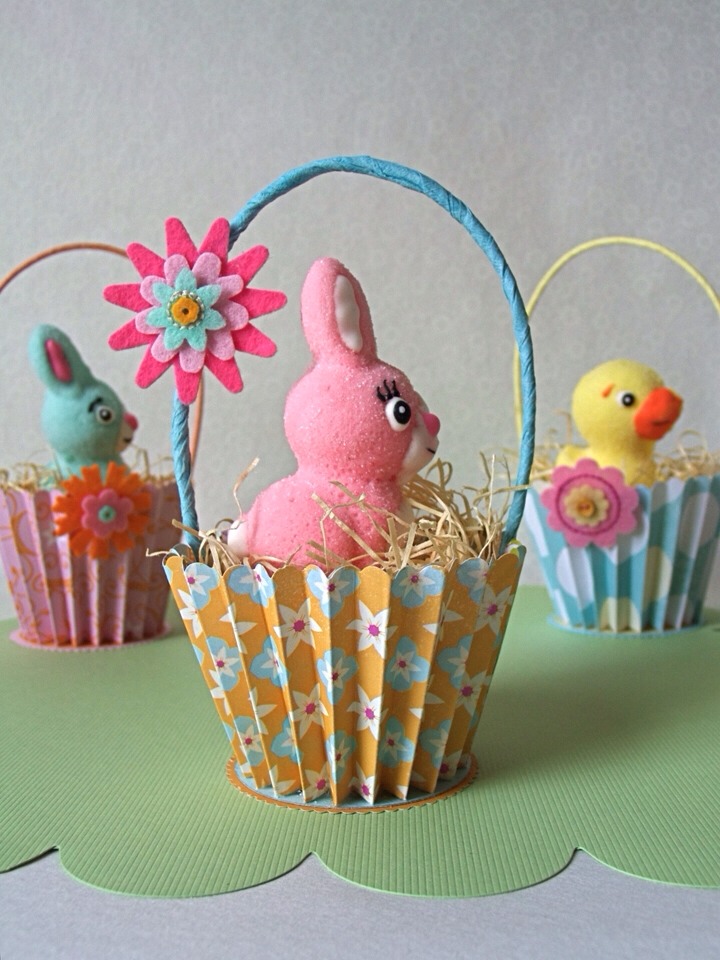Cupcake holders- fill with straw few chocolates and a topper a little chick or rabbit from the pound store. 