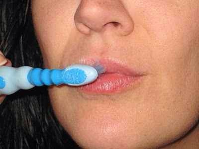 Use a tooth brush to exfoliate your lips! Try a honey, green tea, and sugar scrub with it!