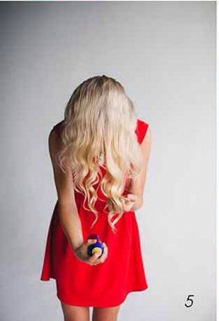 5.  When curls are cooled, release then from elastic. Shake out locks and spray with a flexible hold hair spray.