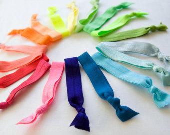 Hair ties  (this type doesn't leave indents in your hair, which is nice if you are going somewhere after school)
