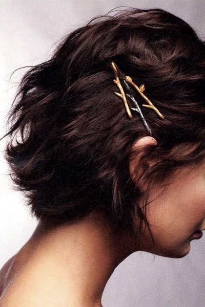 Dress up short hair with decorative bobby pins, like this twig design

