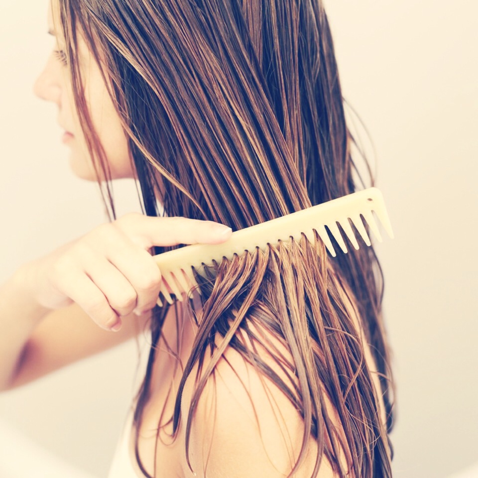 Don't brush your hair when it's wet! Your hair isn't as strong when it's wet as it is when it's dry. A brush will snag at your hair when wet, causing breakage and split ends. Finger comb your hair, or spray in a detangler and comb it with a wide tooth comb.