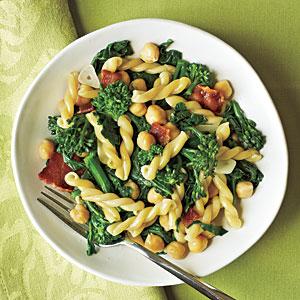  Increase heat to medium-high. Add garlic and chickpeas to drippings in pan; sauté 2 minutes or until garlic is golden. Stir in broccoli rabe, 1/2 teaspoon salt, and 1/4 teaspoon freshly ground black pepper; cook 3 minutes or until broccoli rabe is heated. 
