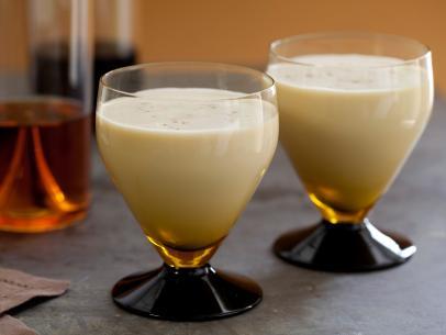 Place the egg whites in the bowl of a stand mixer and beat to soft peaks. With the mixer still running gradually add the 1 tablespoon of sugar and beat until stiff peaks form.

Whisk the egg whites into the mixture. Chill and serve.

