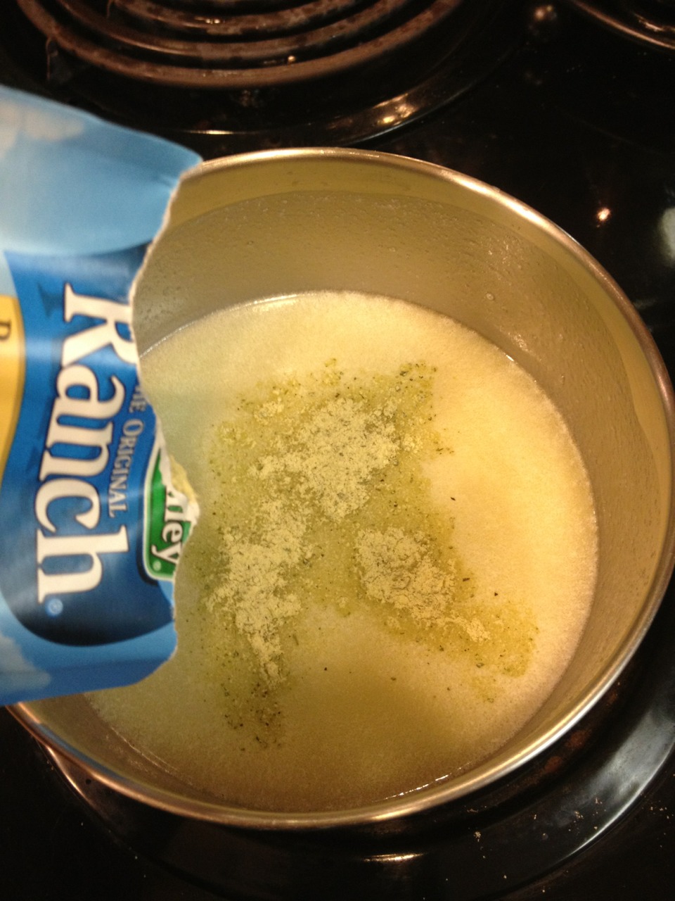 Grab a half stick of butter & melt
When it's fully melted stir in a packet of hidden valley ranch & turn off the heat