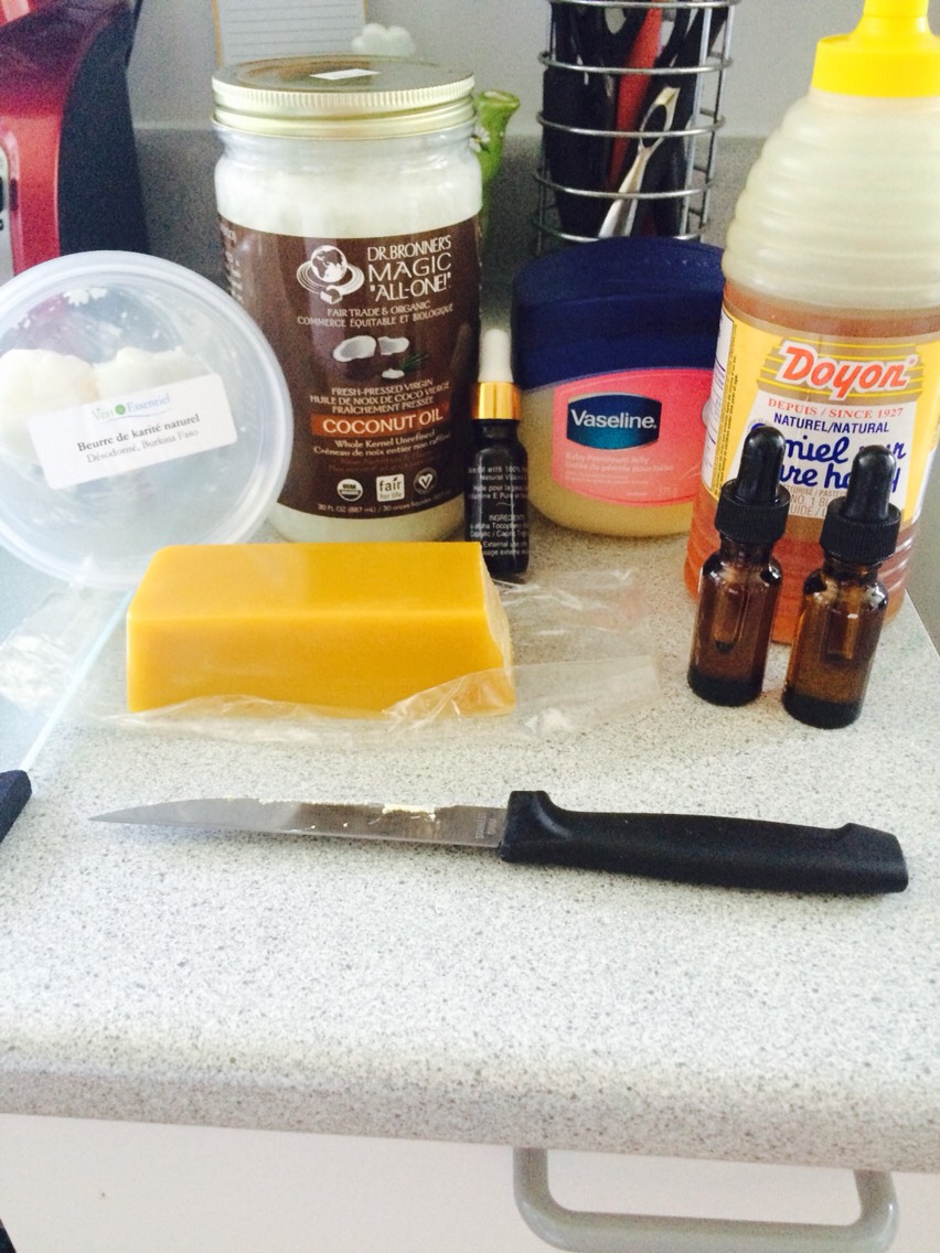 You will need:

-Shea butter 
-coconut oil 
-Bees wax 
-essential oil of your choice 
-vitamine e oil
-vaseline (optional)
-Honey (optional)