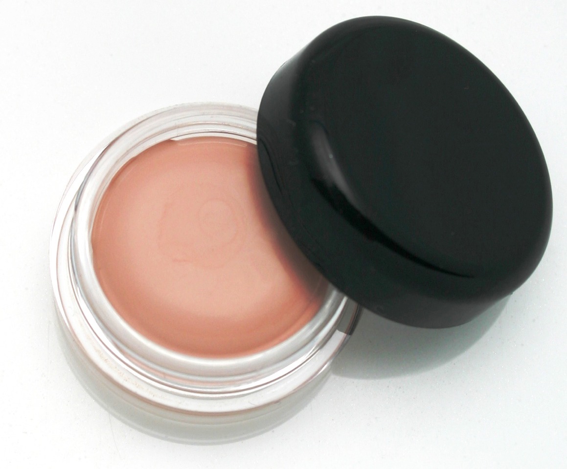 A cream concealer will do a better job than liquid foundation since you won't need as much product and concealer doesn't need to be set. Dab on a little of this before applying your lipstick! 