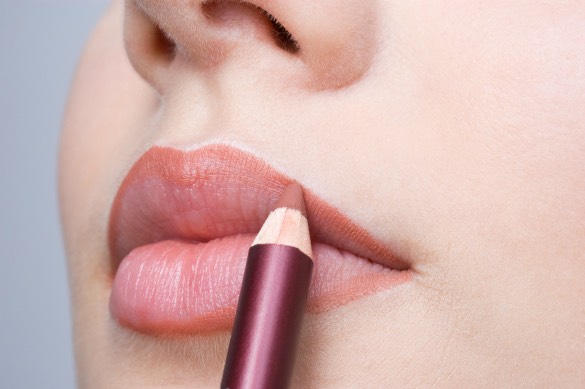 Apply a lip liner slightly darker than the lipstick you will be applying.
For a fuller lip look as end product go a little on to your skin at the top center of your lips where the small dip is.