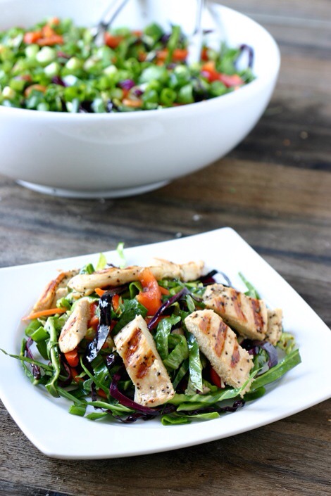 Oriental Chicken Salad

Garlic, onions, sesame oil, ginger, and marinated chicken combine to make for a meal that rivals Chinese takeout! To take this bowl up a notch, simply toss in some chow mein noodles. Yum!
