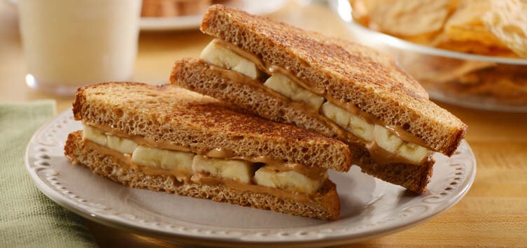 Peanut butter and banana on whole wheat. It's loaded with fiber and flavor, and the banana adds natural sweetness as well as nutrients that you wouldn't get from jelly or spread. Bonus: you don't need to refrigerate! I pack a sandwich for lunch and don't have to worry about it spoiling.