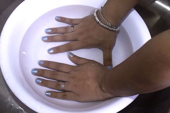 To quickly dry your nails, soak them in ice cold water for 3 minutes