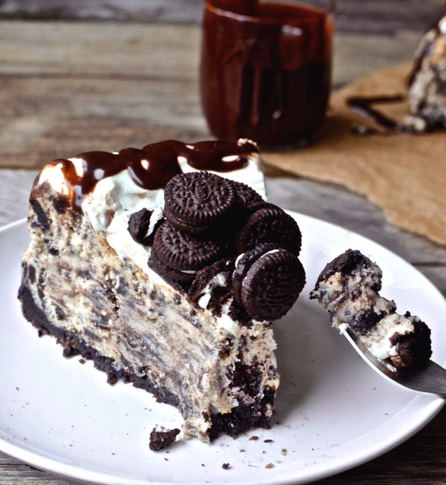 Mix the condensed milk, brown sugar, and cocoa powder together in a saucepan. Cook until it begins to boil. Remove from heat and stir in the chocolate, butter, and vanilla. Store in the refrigerator and reheat before serving.