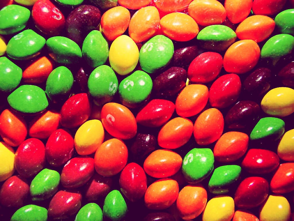Take a big bag of skittles (the sharing bags) and pour them into the vodka bottle. You'll have to empty some of the vodka out first, or you can make this in a separate bottle.