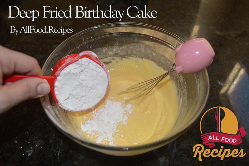 Mix up the cake batter according to the box instructions, and add in one extra cup of flour 