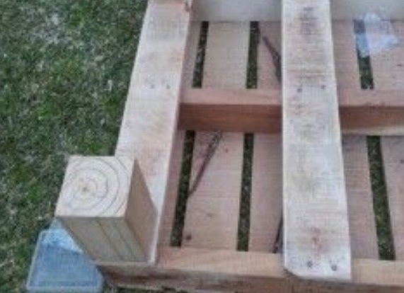 Add wood blocks to the corners (nail them down is preferable)