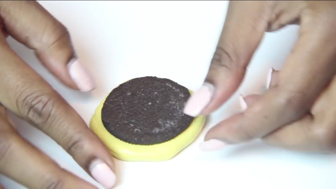 Press a Oreo cookie face side down onto the silicon mold 