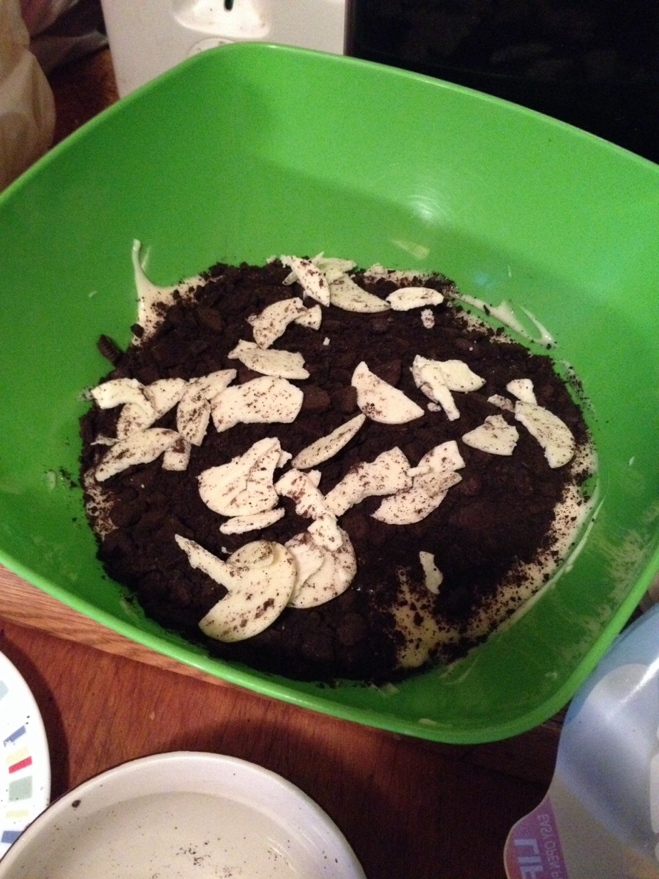 First, put a layer of crushed Oreos on the bottom of the bowl. 
Then put the Oreo fillings on top of the crushed Oreos. 
Next put a layer of pudding on top of the Oreos & fillings. 