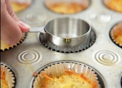 Firmly press potatoes in muffin cups with bottom of 1/4-cup dry measuring cup.