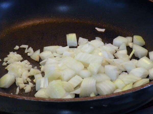 Spray a large non-stick skillet with the olive oil spray, then sauté the onions and garlic until they start to brown. If they give you any trouble sticking, a quick splash of water or broth will fix that.