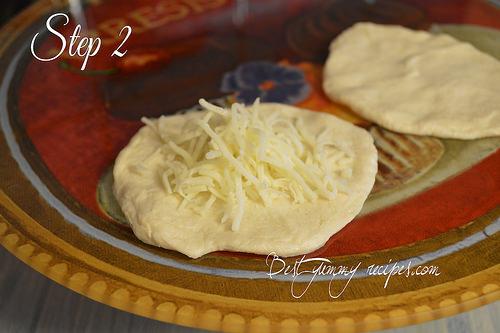 Step 2. Add grated mozzarella cheese