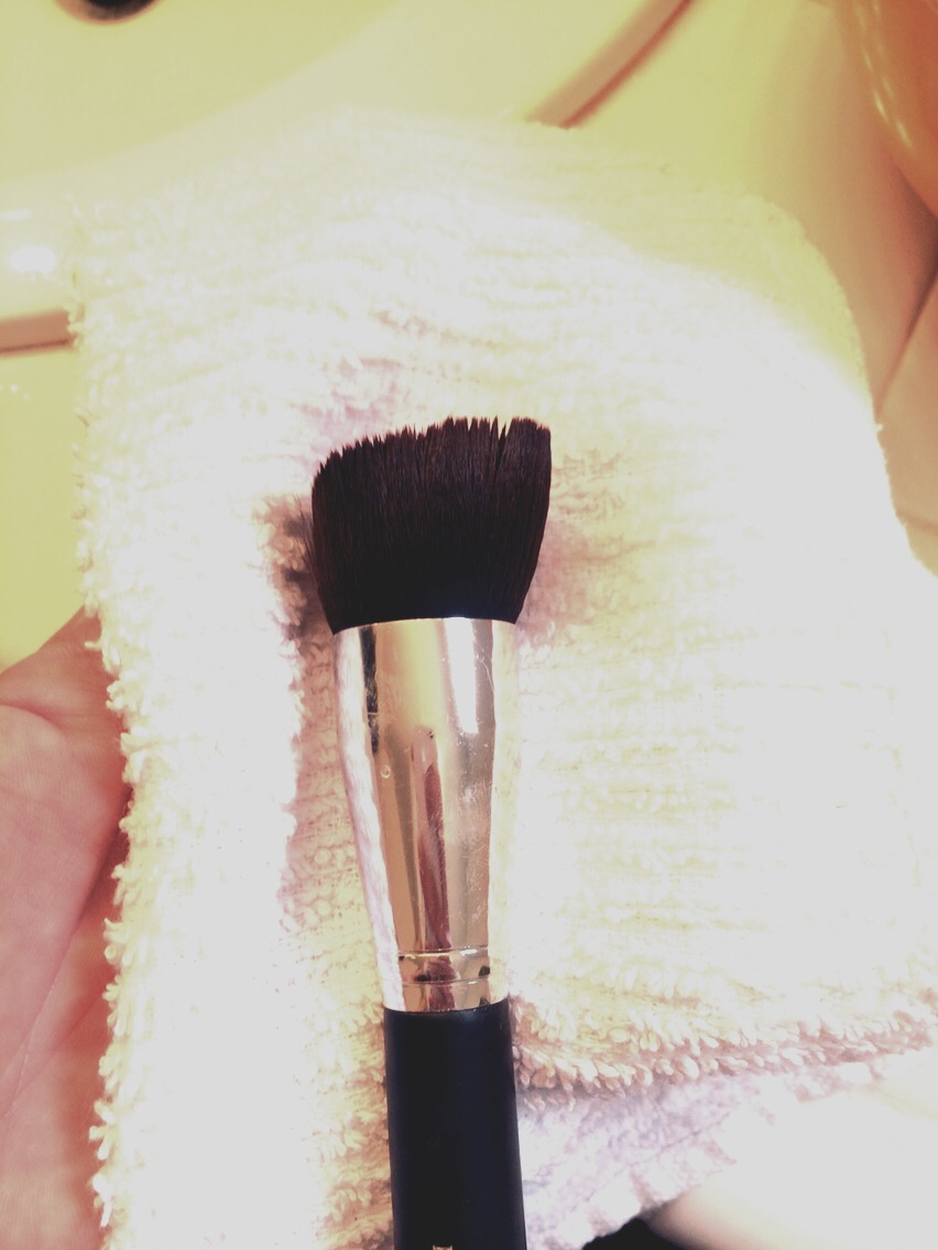 Once water runs clear, gently dry off excess water from bristles.

My concealer brush always takes the longest because the liquid concealer I use is really good at staying on! 