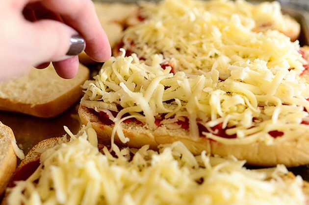 3) Add whatever toppings you'd like on top of the cheese and sprinkle with Parmesan

4) Once all assembled, put the pan in the oven on the lowest rack for 8 to 10 minutes. 